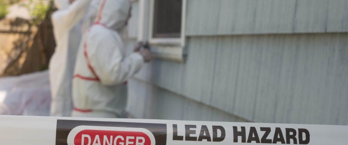 Two,House,Painters,In,Hazmat,Suits,Removing,Lead,Paint,From